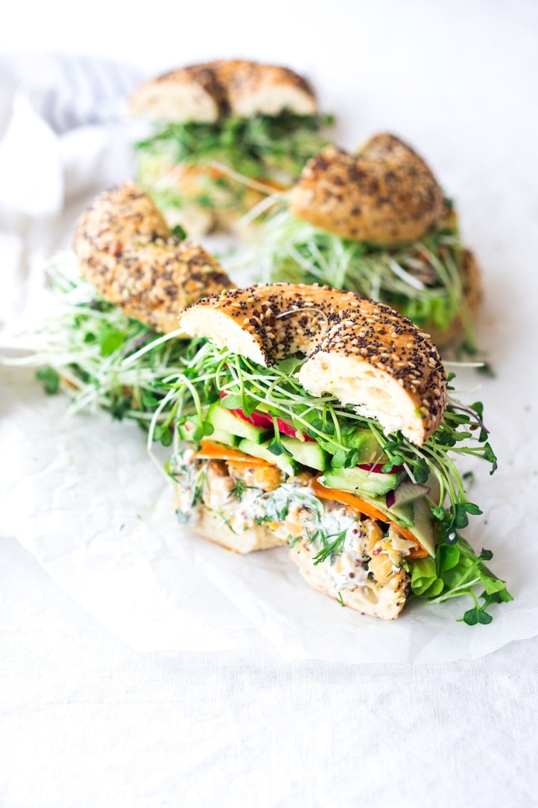 Green Goddess Sandwich with herby chickpea salad, crunchy carrots & radishes, cucumber, avocado and sprouts. Vegan and Gluten-free adaptable!