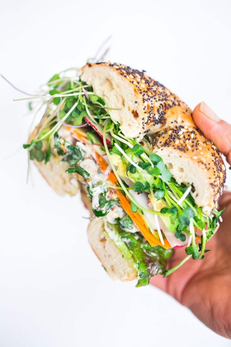 Spring Goddess Sandwich with herby chickpea salad, crunchy carrots & radishes, cucumber, avocado and sprouts. Vegan and Gluten-free adaptable!