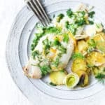 Sheet Pan Dover Sole with Potatoes, leeks, Lemon & Dill Oil- a simple healthy dinner that can be made in 25 minutes. #dill #sole #dillsauce #fishrecipe #healthyfish