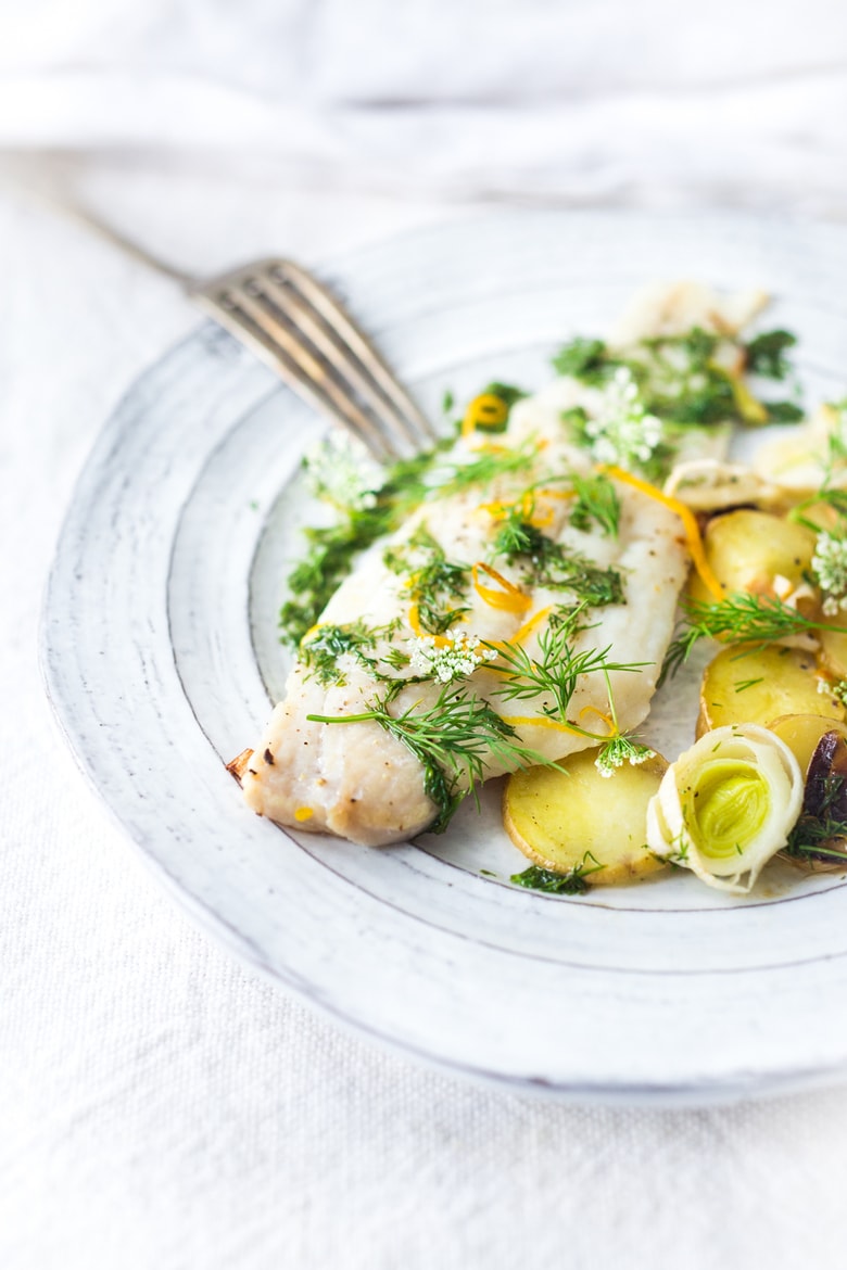 Dover Sole with Lemon, Dill and Leeks, a simple healthy sheet pan dinner that can be made quickly and easily. 