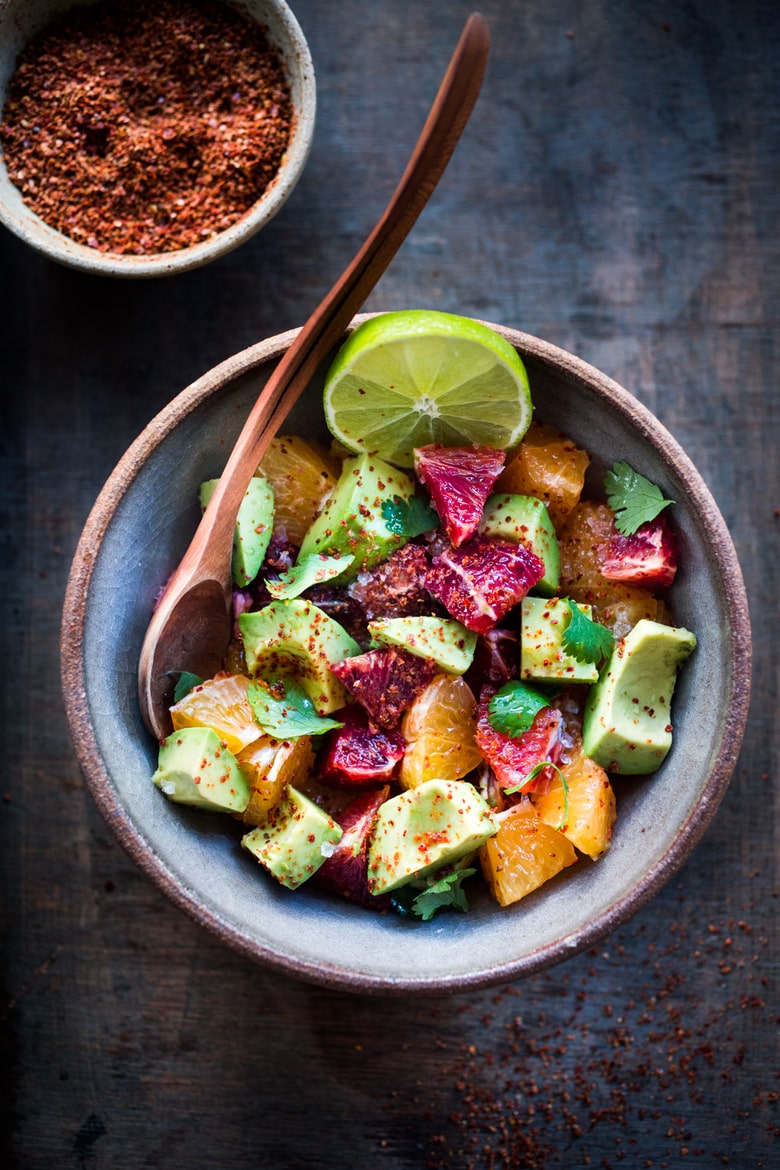 Orange and Avocado Salad with cilantro, jalapeno, lime,  and optional Aleppo chili flakes. Vegan, refreshing and healthy! Use blood oranges when in season, for added color! #avocadosalad #avocadoorangesalad #vegansalad #citrussalad #bloodoranges #Orangesalad #bloodorangesalad |www.feastingathome.com 