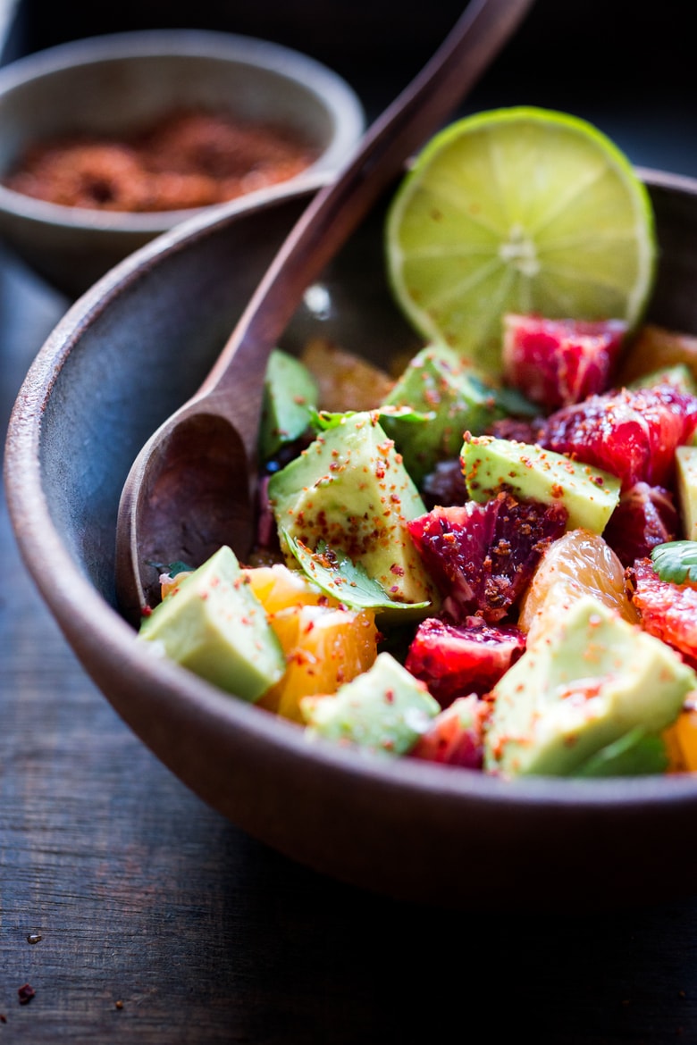 Orange and Avocado Salad with cilantro, jalapeno, lime,  and optional Aleppo chili flakes. Vegan, refreshing and healthy! Use blood oranges when in season, for added color! #avocadosalad #avocadoorangesalad #vegansalad #citrussalad #bloodoranges #Orangesalad #bloodorangesalad |www.feastingathome.com 