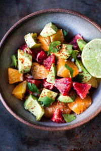 A simple delicious recipe for  Orange and Avocado Salad with Lime juice, chili flakes and cilantro. 