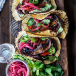 Sheet-Pan, Chipotle Portobello Tacos - smoky, spicy and "meaty"  - these VEGAN tacos are sure to satisfy even the most diehard meat-lovers!  Make them in 30 minutes! | www.feastingathome.com #vegantacos #portobellotacos