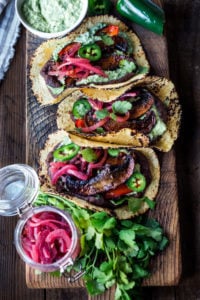 Sheet-Pan, Chipotle Portobello Tacos - smoky, spicy and "meaty"  - these VEGAN tacos are sure to satisfy even the most diehard meat-lovers!  Make them in 30 minutes! | www.feastingathome.com #vegantacos #portobellotacos