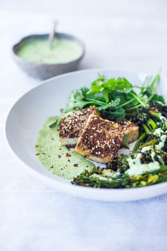 50 Delicious Tofu Recipes: Zaatar Tofu with Green Tahini Sauce and Broccolini.