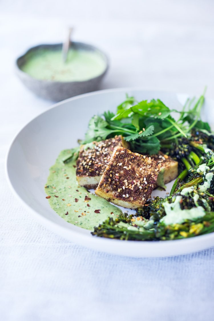 Zaatar Tofu with Green Tahini Sauce and Broccolini - a simple flavorful Middle Eastern sheet-pan dinner that is vegan adaptable and gluten free.