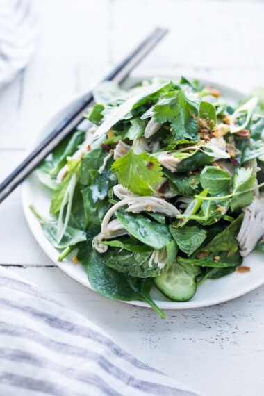 Thai Chicken Salad with baby spinach, spring herbs and scallions. A flavorful Thai-inspired Entree Salad. #coconutchicken #coconut #spinachsalad #thaisalad