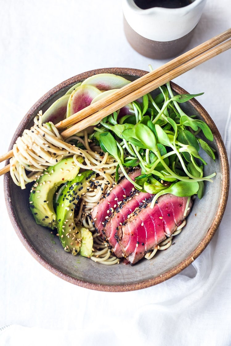 Asian Noodle Bowl- loaded up with fresh seasonal veggies and a delicious Ponzu Dressing, this healthy bowl can be made with seared ahi tuna or sesame ginger tofu. Vegan and Grain-free adaptable! ( Try it with zucchini noodles!) 