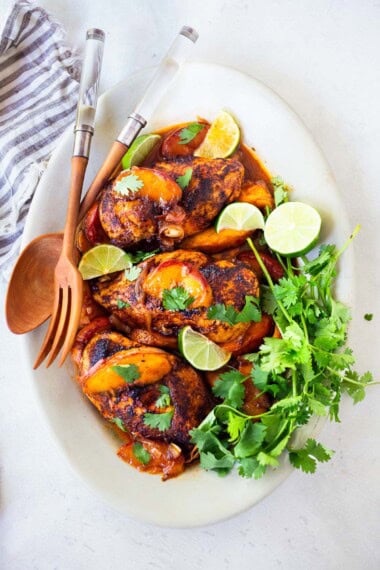 This peach chicken recipe is fast and easy and highlights fresh, juicy summer peaches! Made with chicken breasts or thighs, with savory, smoky Mexican spices. Grill it or pan-sear it- either way, you'll love it!