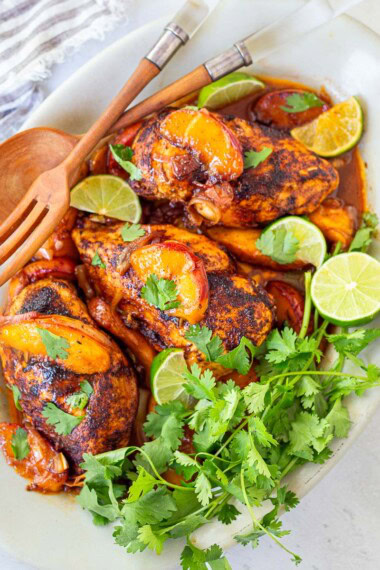 This peach chicken recipe is fast and easy and highlights fresh, juicy summer peaches! Made with chicken breasts or thighs, with savory, smoky Mexican spices. Grill it or pan-sear it- either way, you'll love it!