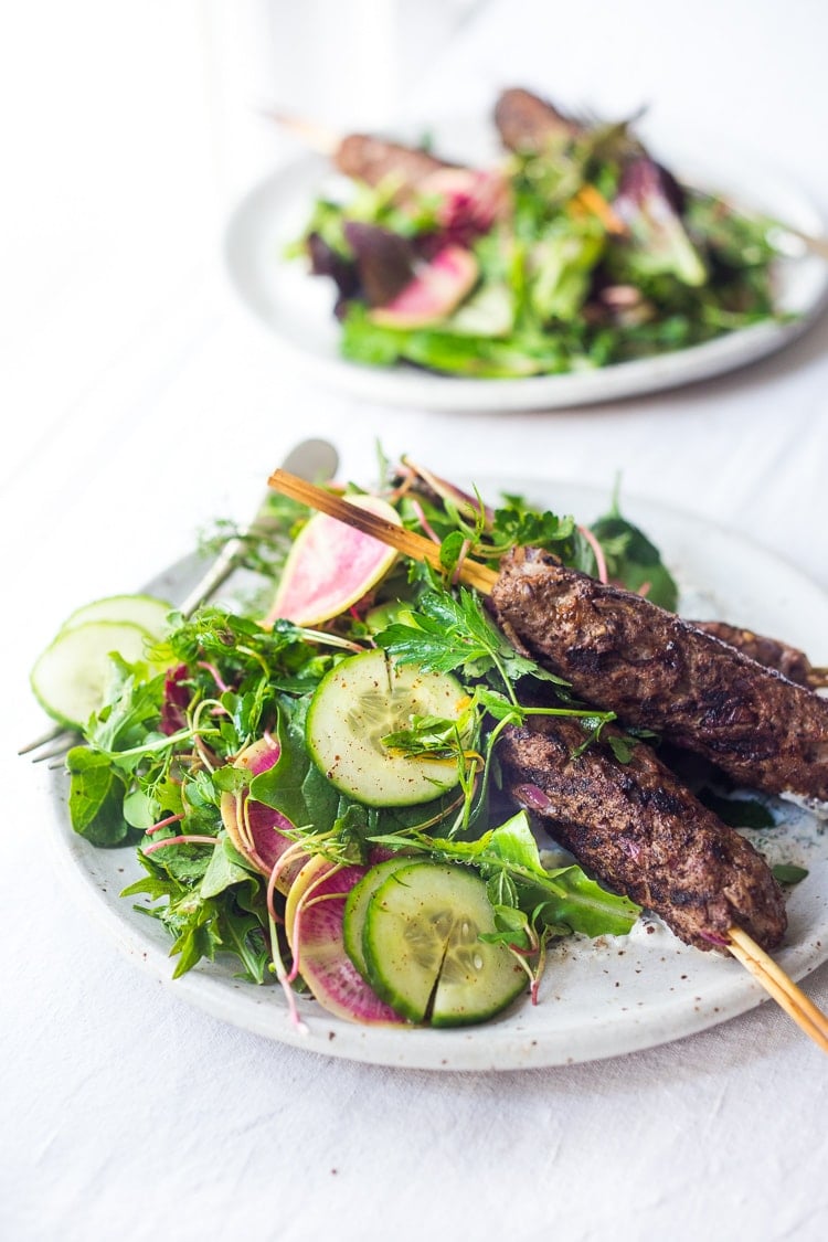 Grilled Lamb Kebabs with herb salad and yogurt sauce 