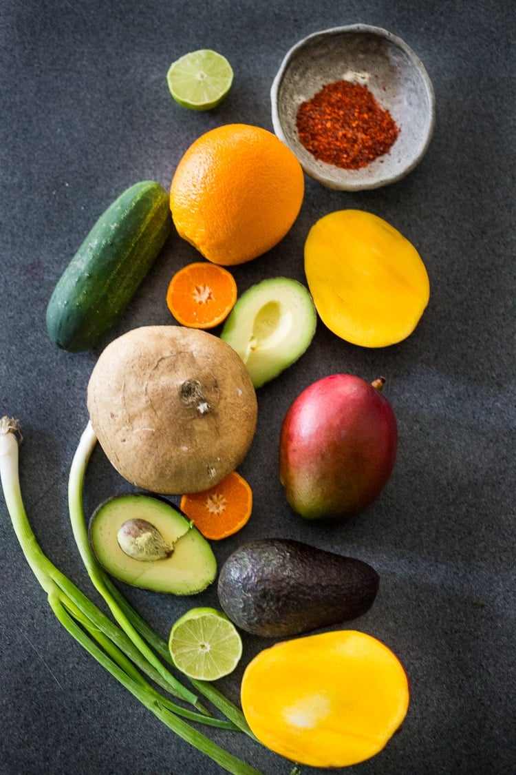 Jicama Salad with Mango, Cucumber, Avocado, Lime and Aleppo Chile Flakes - a delicious healthy side dish that pairs well with grilled chicken and fish. Perfect for alfresco dining, outdoor gatherings, barbecues and potlucks!  #potluck #mangosalad #jicamasalad #potluckideas #vegan #jicama