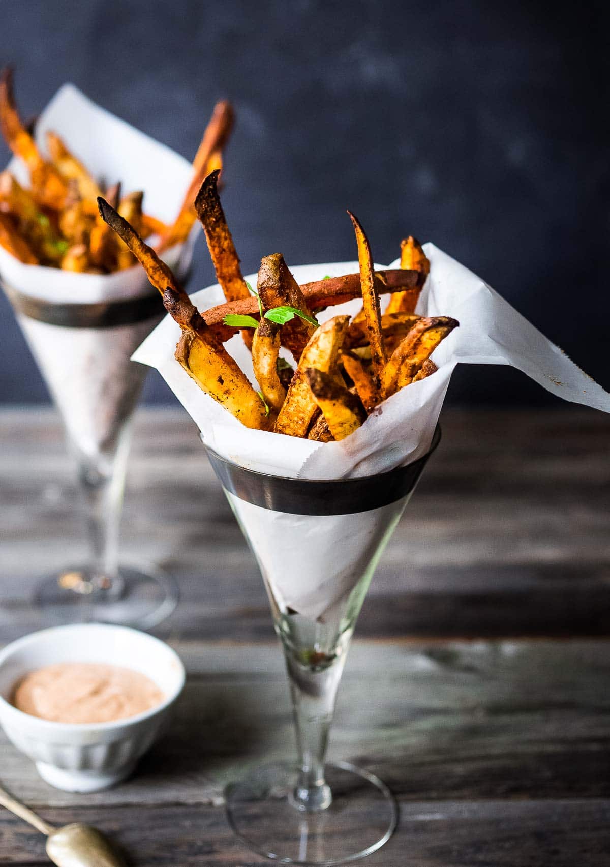 These Sweet Potato Fries can be baked in the oven, or in your air fryer. Healthy, easy and oh-so crispy! Vegan.
