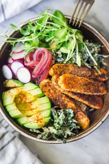 This healthy vegan tempeh salad recipe is hearty enough for dinner and can be turned into a wrap. It's made with cajun blackened tempeh, kale, avocado, radishes, pickled onions, and a creamy vegan Cajun Ranch Dressing!