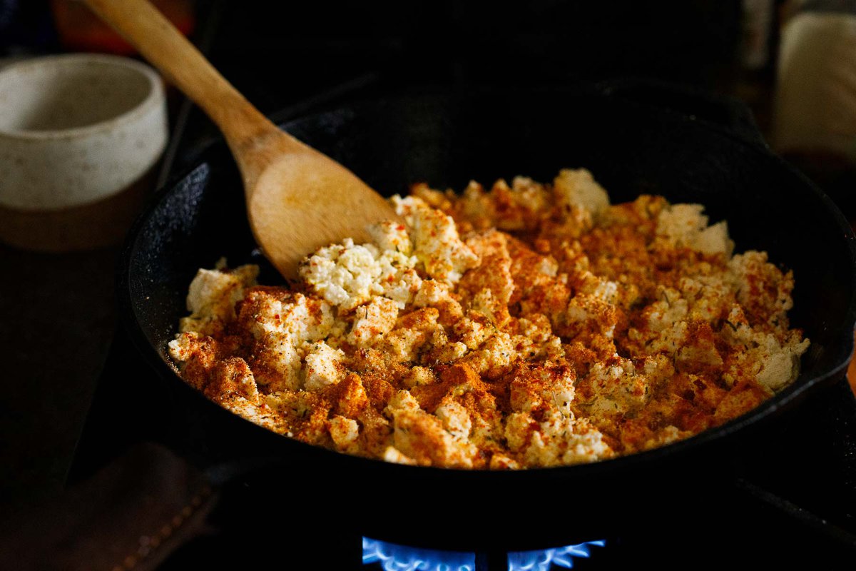 Seasoning the tofu scramble.