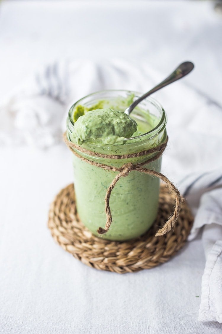 Vegan Green Goddess Dressing that is creamy without added nuts or avocado- made with silken tofu! Healthy, low-calorie and FULL OF FLAVOR! #greengoddessdressing #vegan #vegandressing #vegangoddess #healthygreengoddess #nonuts #vegangreengoddessdressing #lowcaloriedresssing #healthydressing 