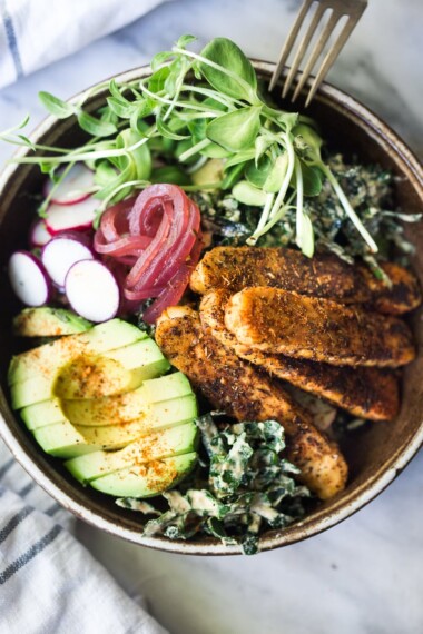 Vegan Kale Salad with Blackened Tempeh, Avocado, radishes, micro greens, pickled onions and a creamy VEGAN Cajun Ranch Dressing.