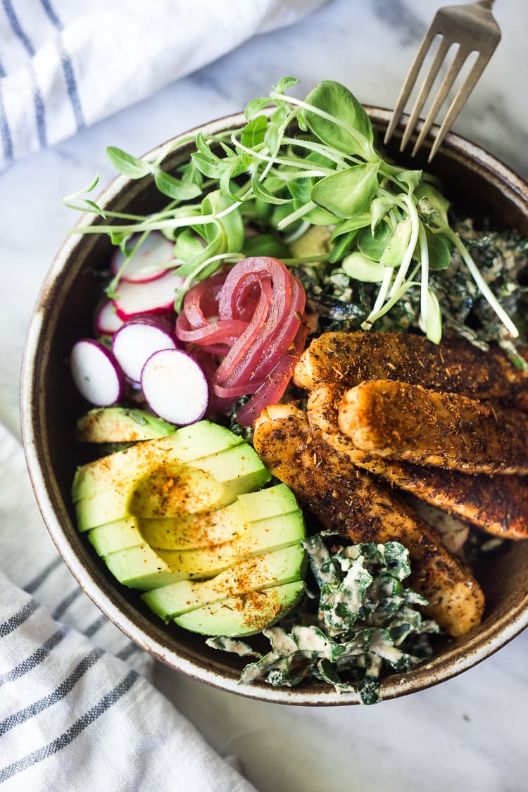 Kale Salad with Blackened Tempeh, Avocado, Kale, Radishes, Pickled Onions and a Creamy VEGAN Cajun Ranch Dressing that can be made into a hearty entree salad, grain bowl, or packable wrap.  #tempeh #veganranch #vegan #glutenfree #healthybowl 