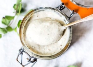 A delicious recipe for Creamy Vegan Ranch Dressing that can be made without oil!  Low calorie & made with silken tofu. Dairy-free, Nut-free, Gluten-Free and ZERO Cholesterol! Perfect for salads, wraps, bowls or as a veggie dip! #veganranch #nooil #nut-free #vegan #ranch