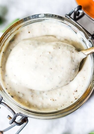 A delicious recipe for Creamy Vegan Ranch Dressing that can be made without oil!  Low calorie & made with silken tofu. Dairy-free, Nut-free, Gluten-Free and ZERO Cholesterol! Perfect for salads, wraps, bowls or as a veggie dip! #veganranch #nooil #nut-free #vegan #ranch