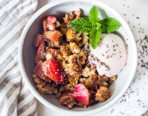 Maple-Sweetened Strawberry Rhubarb Crisp with Chia Seeds and a crumbly oat topping - a vegan, gluten-free dessert that highlights spring rhubarb. #vegan #glutenfree #crisp #rhubarb #rhubarbcrisp #rhubarbrecipes