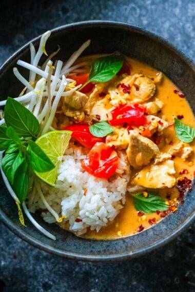 This Thai Red Curry recipe is bursting with authentic Thai flavor and can be made in 30 minutes on the stove or in your Instant Pot! A quick and easy dinner recipe the whole family will love. Serve it with jasmine rice and save the amazing leftovers for lunch! Vegetarian-adaptable.