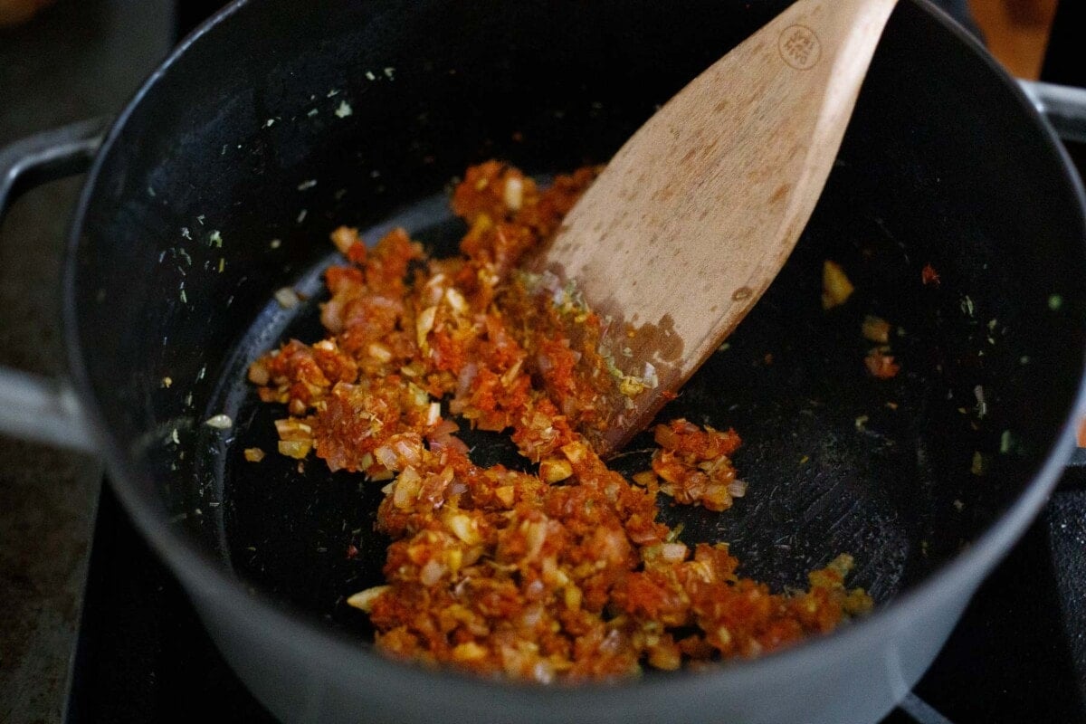 frying the red curry paste.