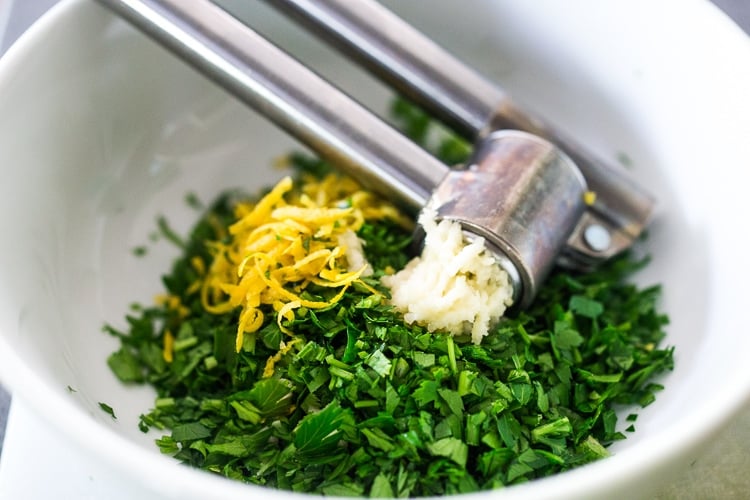 mixing gremolata in a bowl