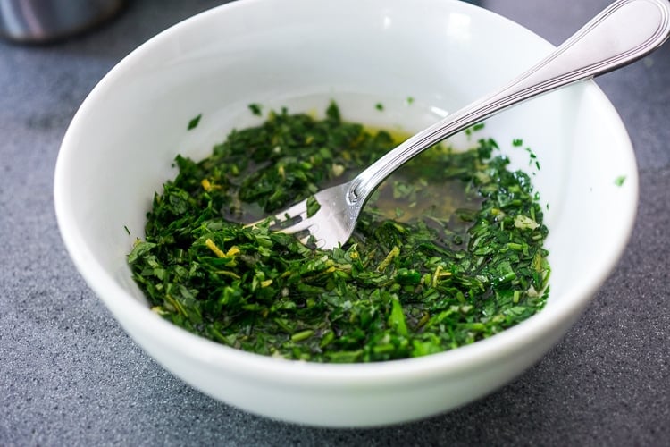 gremolata in a bowl with a fork.