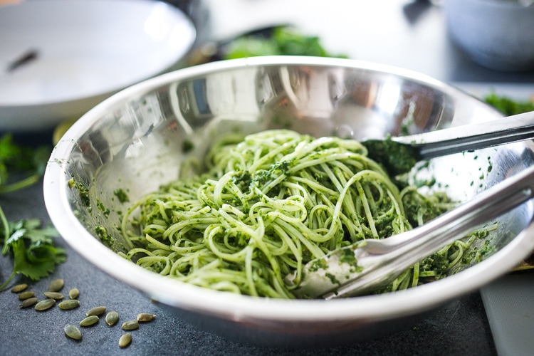 This Corn and Zucchini Pasta Salad is made with gluten-free rice noodles and loaded up with grilled summer veggies, then tossed in the most flavorful Cilantro Pesto.... deliciously addicting! Vegan and Gluten-free! #summerpastasalad #pastasalad #cornpasta #cilantropesto #zucchinipasta #zucchini #potluck