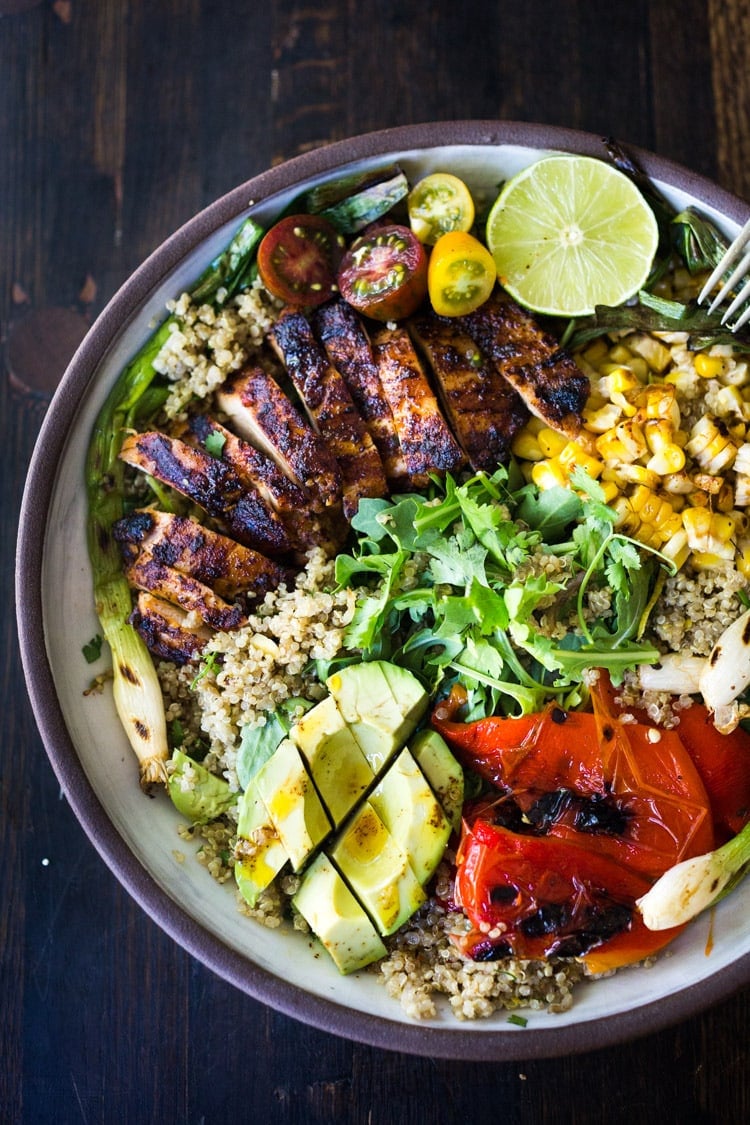 Healthy, Easy, Chipotle Grilled Chicken Salad with Grilled Corn, Peppers and Arugula, over a bed of optional quinoa with grilled scallions, avocado and a simple Chipotle Lime Dressing.  #chickensalad #grilledchickensalad #chipotle #salad #chicken #grilledchicken #quinoa #healthy #arugula