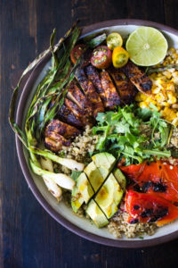 Healthy, Easy, Chipotle Grilled Chicken Salad with Grilled Corn, Peppers and Arugula, over a bed of optional quinoa with grilled scallions, avocado and a simple Chipotle Lime Dressing.  Sub MEXICAN TOFU for the Chicken for a vegan version! #chipotlechicken #mexicansalad #chickensalad #grilledchicken