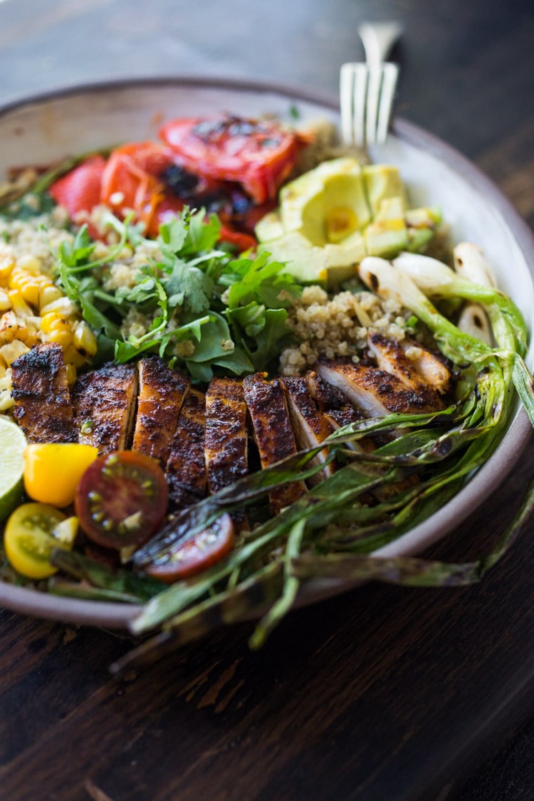 Healthy, Easy, Chipotle Grilled Chicken Salad with Grilled Corn, Peppers and Arugula, over a bed of optional quinoa with grilled scallions, avocado and a simple Chipotle Lime Dressing.  #chickensalad #grilledchickensalad #chipotle #salad #chicken #grilledchicken #quinoa #healthy #arugula