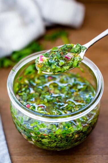 Quick and Easy Chimichurri Sauce - an herby flavorful sauce that will quickly become your new favorite condiment that can be made in 10 minutes!