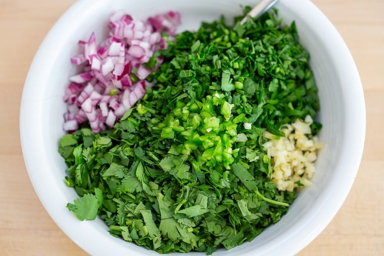 place Chimichurri ingredients in a bowl and mix