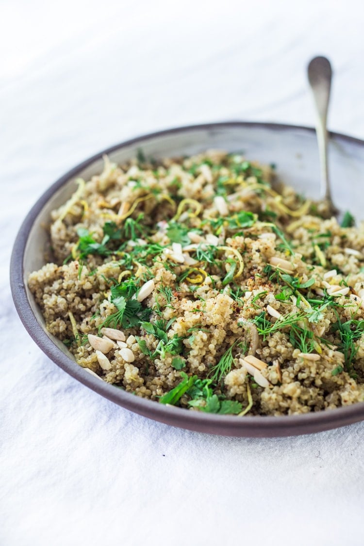 Simple, easy, Everyday Quinoa with Lemon, Shallot and Herbs - a delicious, healthy side dish that is perfect for potlucks or Sunday meal prep. Vegan, gluten-free and full of flavor! #quinoa #easyquinoa #vegan #glutenfree #healthy #healthyside #sidedish #wholegrian #quinoarecipe 