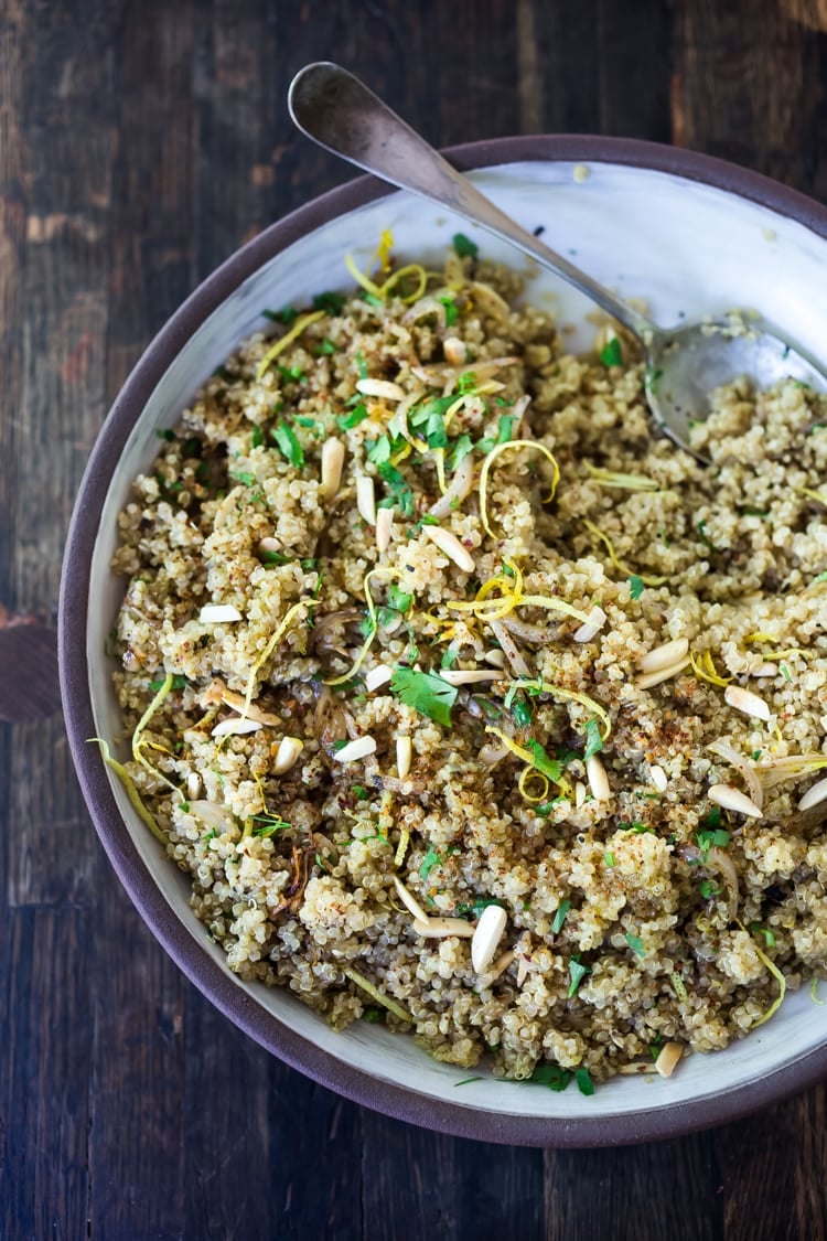 Simple, easy, Everyday Quinoa with Lemon, Shallot and Herbs - a delicious, healthy side dish that is perfect for potlucks or Sunday meal prep. Vegan, gluten-free and full of flavor! #quinoa #easyquinoa #vegan #glutenfree #healthy #healthyside #sidedish #wholegrian #quinoarecipe 