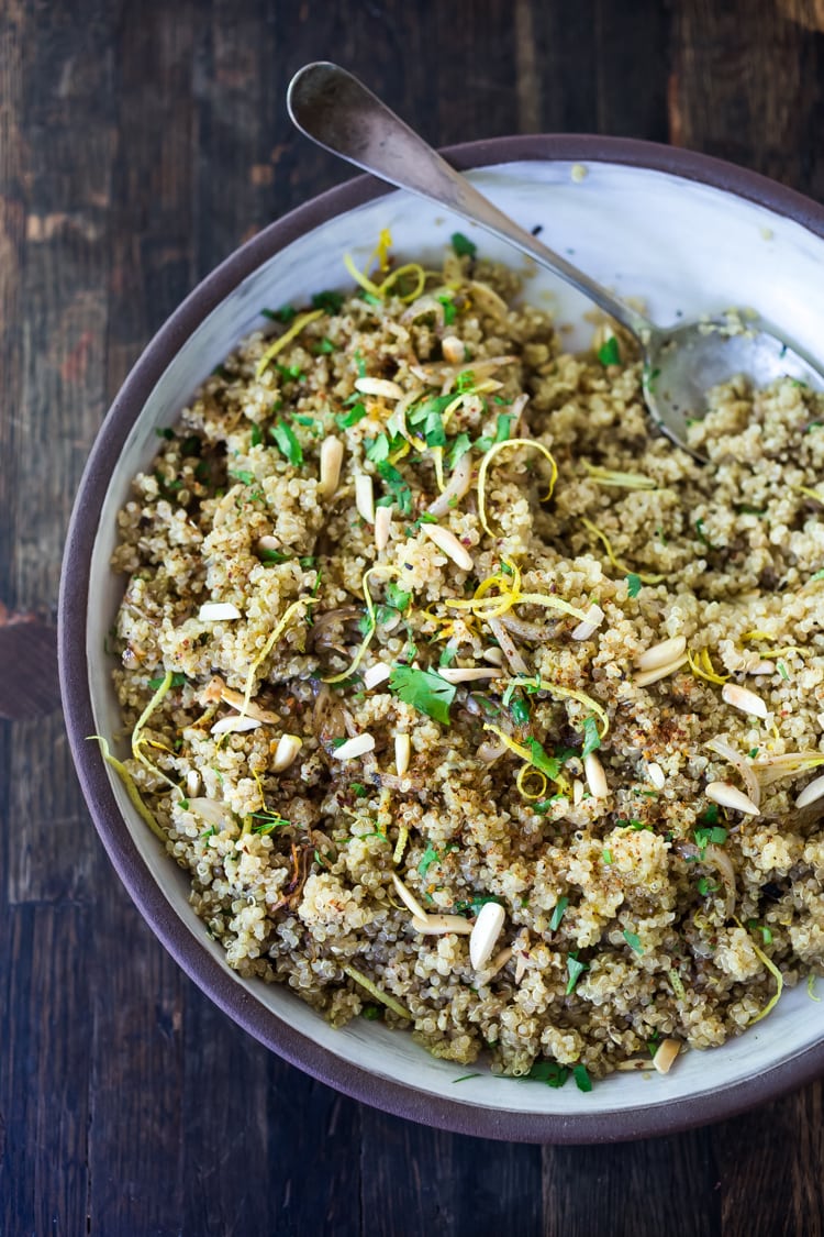 Simple, easy, Everyday Quinoa with Lemon, Shallot and Herbs - a delicious, healthy side dish that is perfect for potlucks or Sunday meal prep. Vegan, gluten-free and full of flavor! #quinoa #easyquinoa #vegan #glutenfree #healthy #healthyside #sidedish #wholegrian #quinoarecipe