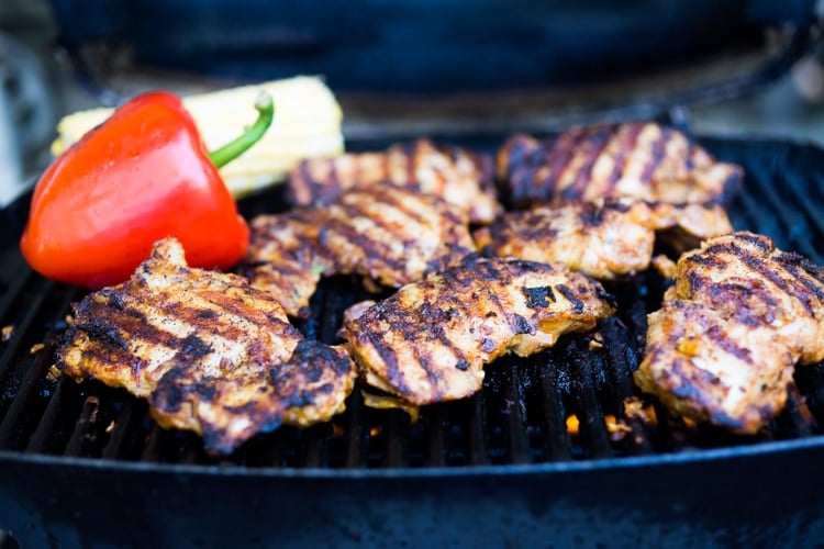 Smoky, spicy and delicious, this Grilled Chipotle Chicken is bathed in the most flavorful marinade. Grill the chipotle chicken ahead and reheat on busy weeknights, or store it in the flavorful chipotle marinade, then fire up the grill after work. Use in burrito bowls, salads, tacos, or pasta. So EASY and oh so tasty! #chipotlechicken #grilledchicken #chicken #chipotle #grilled 