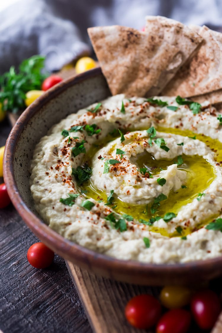 Authentic Baba Ganoush in red ceramic bowl