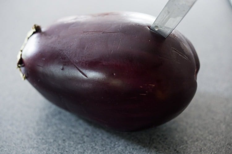 cut slits into the eggplant. 