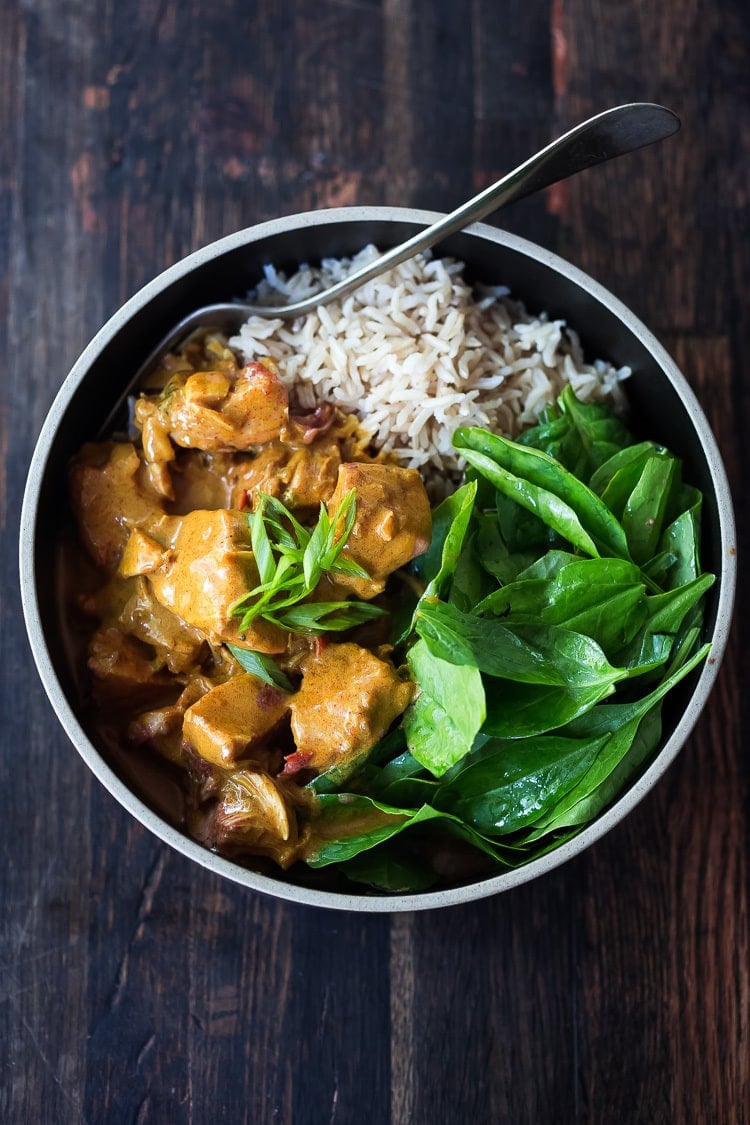 Instant Pot Tikka Masala, made with chicken or kept VEGAN with coconut milk, chickpeas and veggies. Serve over basmati rice, or, for a low-carb, paleo version, serve it over a bowl of baby spinach! #paleo #healthy #tikkamasala #weeknightdinner #instantpottikkamasala #instantpot #chickentikkamasala #vegetariantikkamasala #vegan #instantpotchicken #instantpotchickenrecipes #keto 