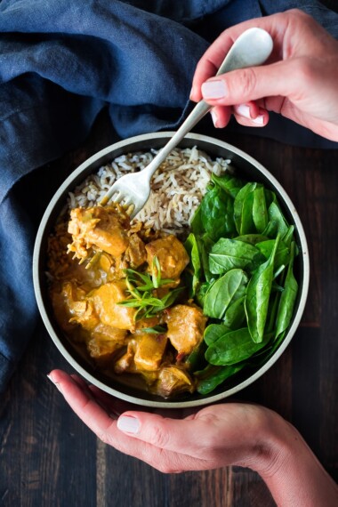 Instant Pot Tikka Masala, made with chicken or kept VEGAN with coconut milk, chickpeas and veggies. Serve over basmati rice, or, for a low-carb, paleo version, serve it over a bowl of baby spinach! #paleo #healthy #tikkamasala #weeknightdinner #instantpottikkamasala #instantpot #chickentikkamasala #vegetariantikkamasala #vegan #instantpotchicken #instantpotchickenrecipes #keto