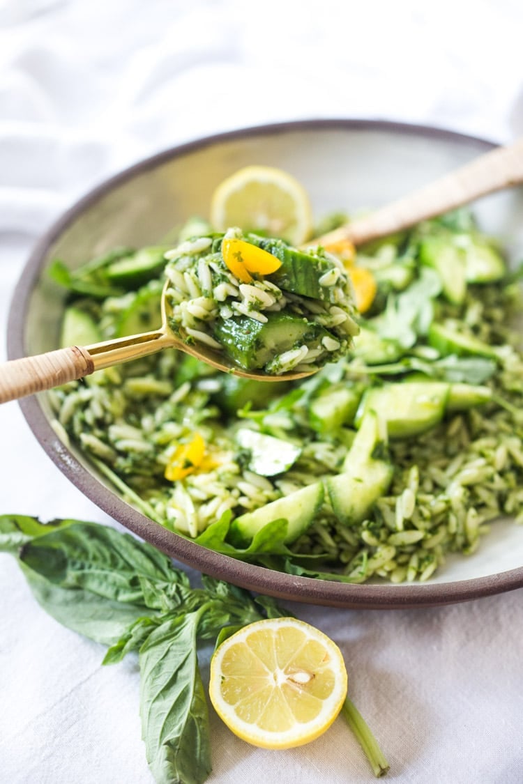 Lemon Basil Orzo Salad with cucumbers, tomatoes and arugula. A healthy, vegan pasta salad that can be made ahead for midweek lunches or potlucks. Keep it vegan or add feta! #orzo #orzosalad #orzopasta #pastasalad #vegan #orzorecipes