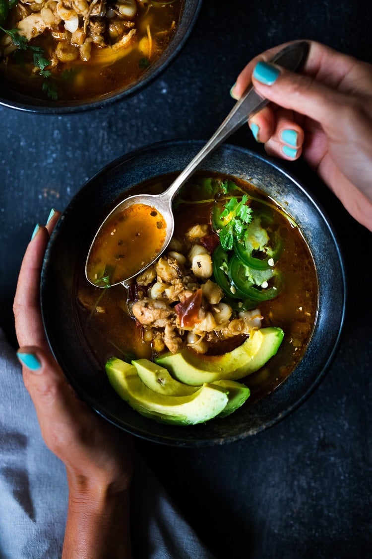 A simple easy recipe for Chicken Pozole that can be made in an Instant Pot or on the stove top. A healthy, delicious, Mexican-inspired weeknight dinner that can be made in 30 minutes! Gluten-free! #instapot #instantpot #pozole #chickenpozole #rojo #weeknightdinner #mexican #healthy