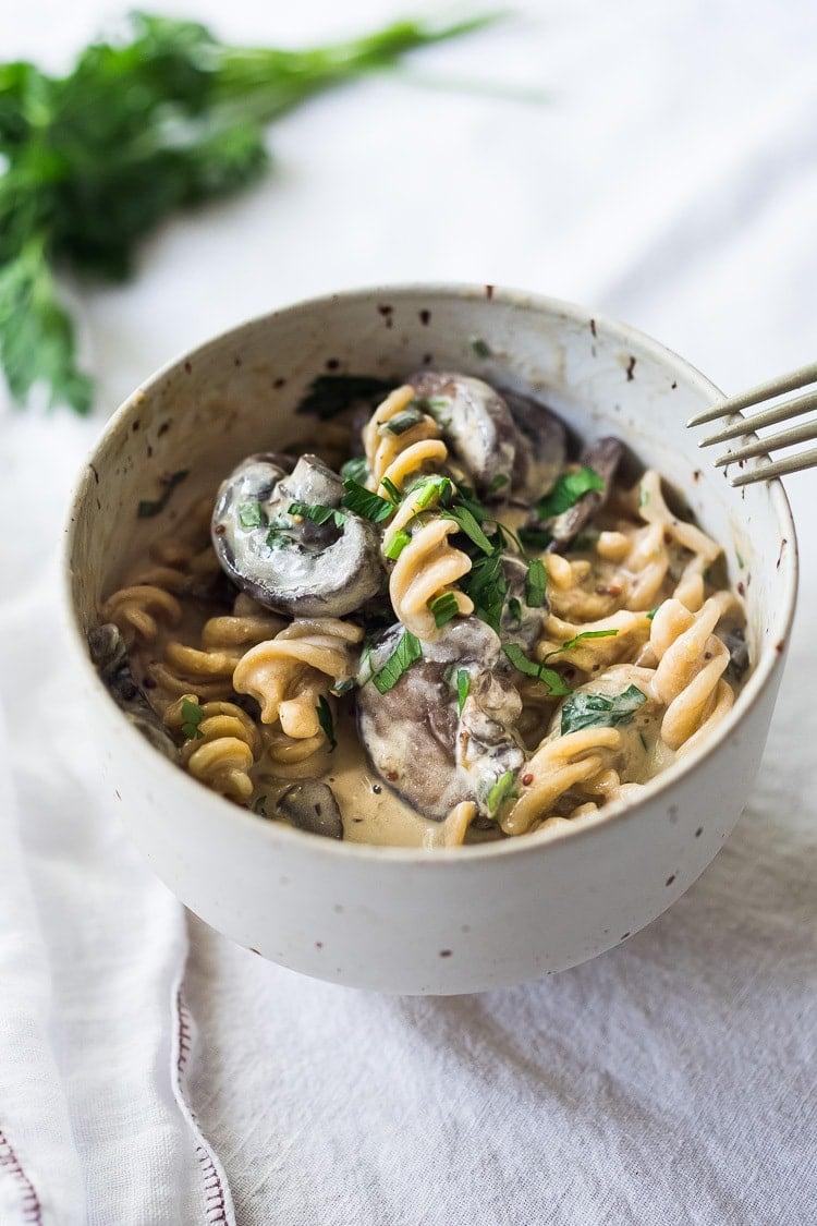 Instant Pot Mushroom Stroganoff - a simple, easy vegetarian weeknight dinner that is creamy, hearty and full of delicious depth and flavor!  Vegan Adaptable! #vegetarian #stroganoff #mushroompasta #veganpasta #instantpotrecipes #instantpot #healthtypasta 