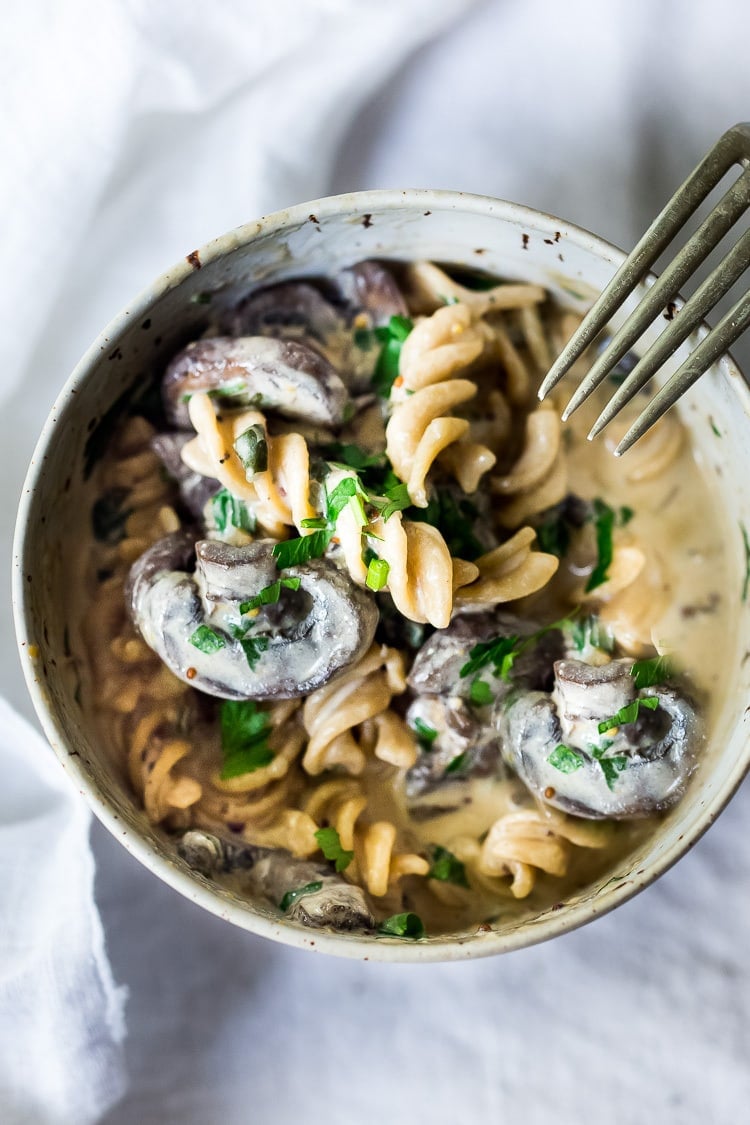 Instant Pot Mushroom Stroganoff - a simple, easy vegetarian weeknight dinner that is creamy, hearty and full of delicious depth and flavor!  Vegan Adaptable! #vegetarian #stroganoff #mushroompasta #veganpasta #instantpotrecipes #instantpot #healthtypasta 