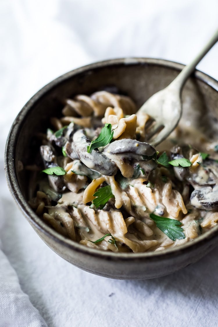 Instant Pot Mushroom Stroganoff - a simple, easy vegetarian weeknight dinner that is creamy, hearty and full of delicious depth and flavor!  Vegan Adaptable! #vegetarian #stroganoff #mushroompasta #veganpasta #instantpotrecipes #instantpot #healthtypasta 