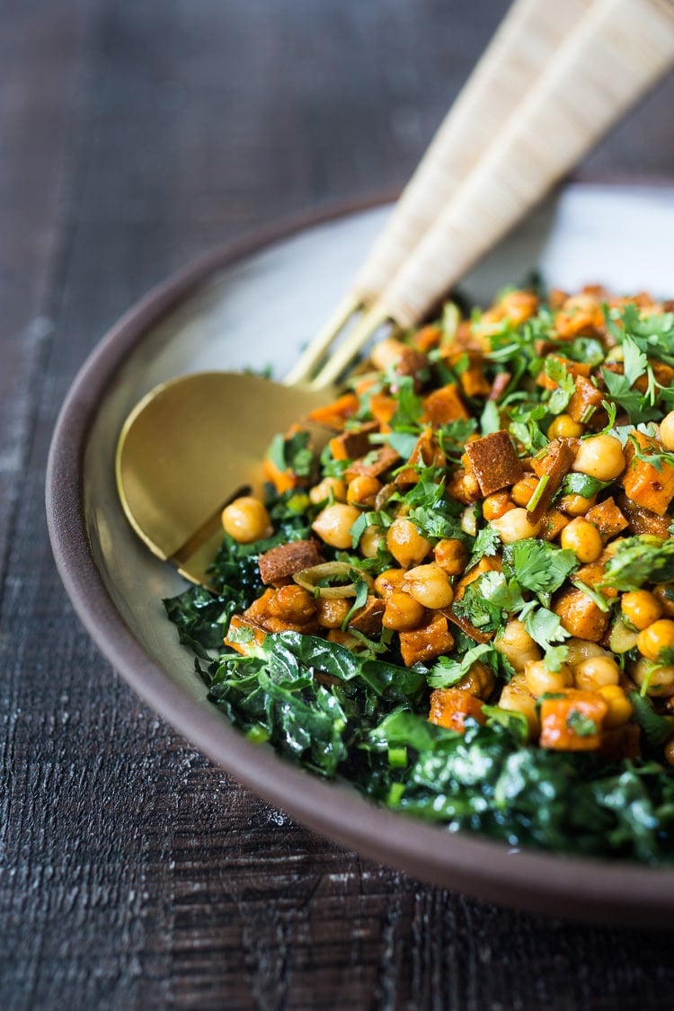 Moroccan Chickpea & Sweet Potato Salad is bursting with flavor! Healthy, vegan and gluten-free, it is EASY to make! Can be made ahead. #sweetpotato #sweetpotatosalad #roastedsweetpotatosalad #roastedsweetpotatosalad #moroccansalad #moroccansweetpotato #vegansalad #potlucksalad #nomayo #healthysalad